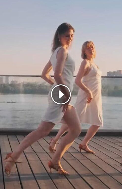 Women dancing on the terrace with blue sky and clouds in the background2 3 screenshot e1667246662736